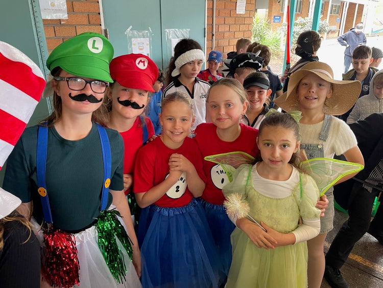 group of students dressed up for book week