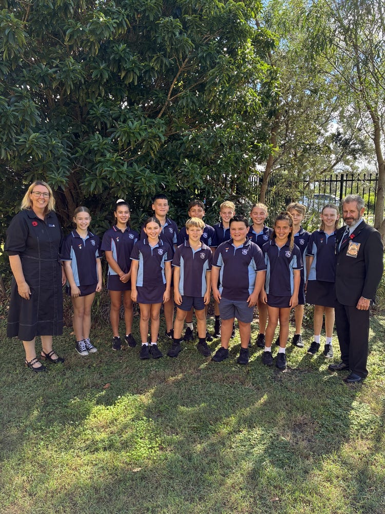 School leaders with principal and community member